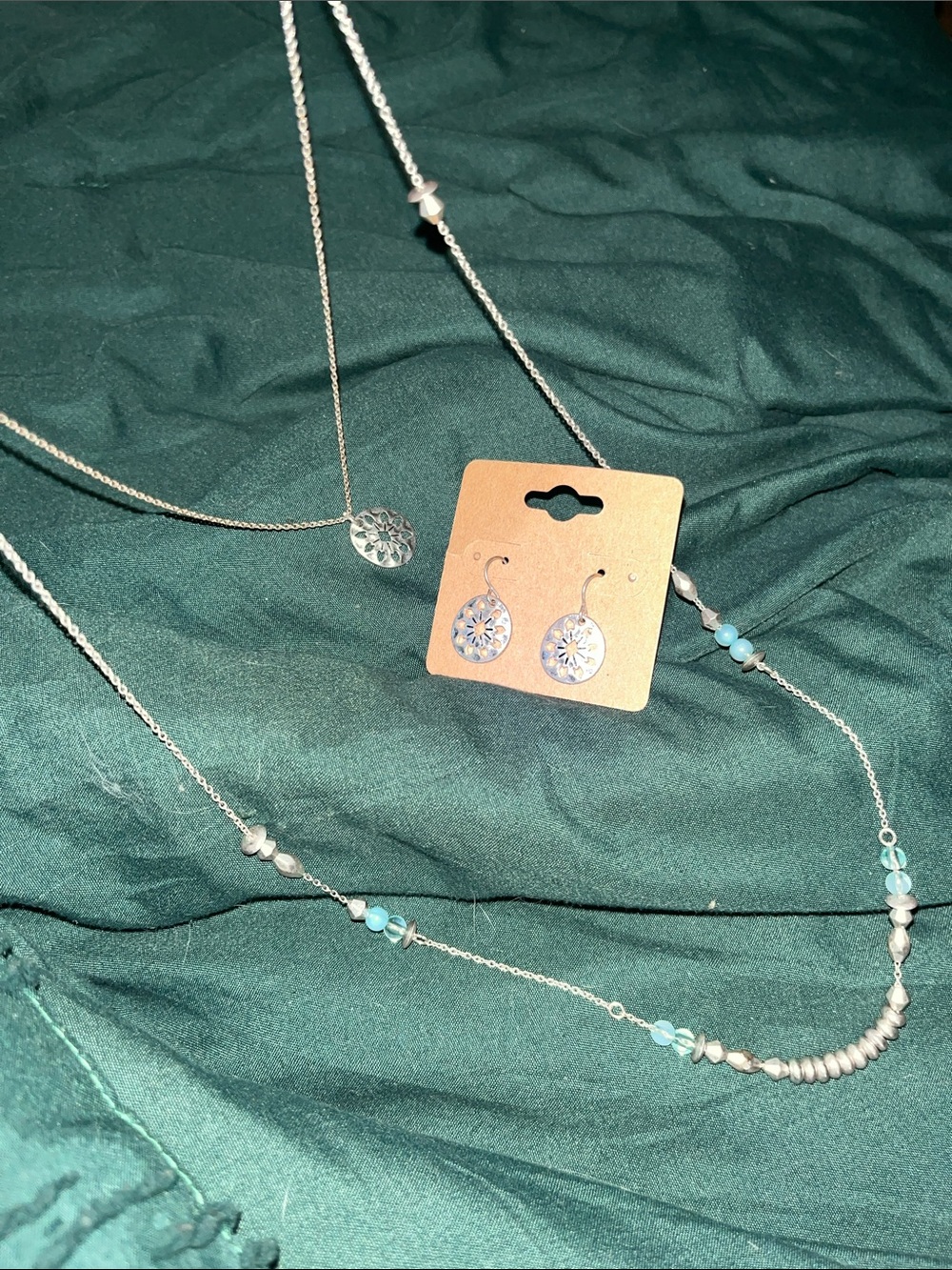 The Sak Silver Tone punched Pendant Necklace and Earrings Set